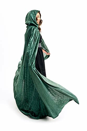 Woman wearing a green velvet hooded cape.